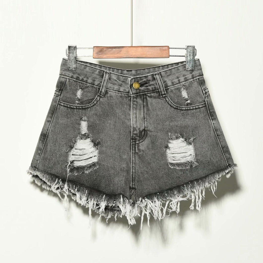 Dove shorts met gaten
